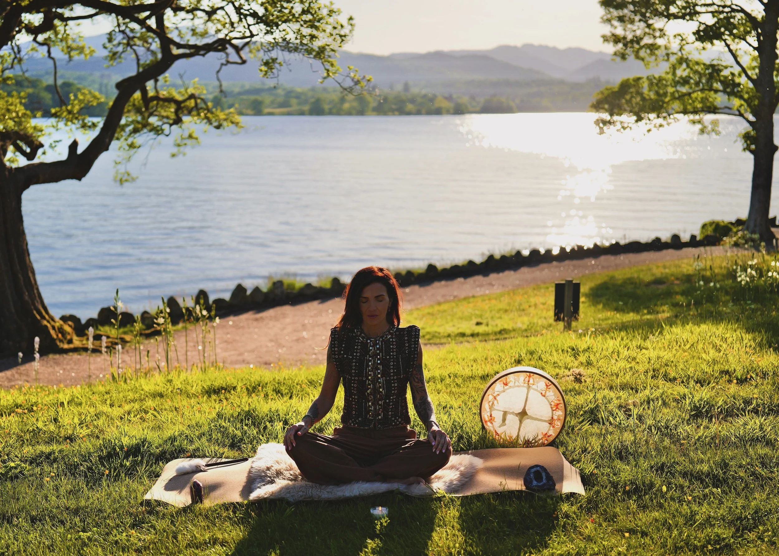 pixi near river meditating