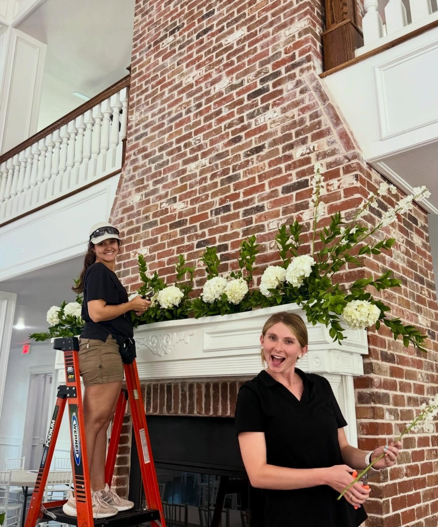 Who are we???

 It&rsquo;s been a while and we have a lot of new faces coming across our page! Our names are Alex (on the ladder doing what she does best) and Sarabeth (the cheer leader and expert flower hander). We are cousins, though technically co