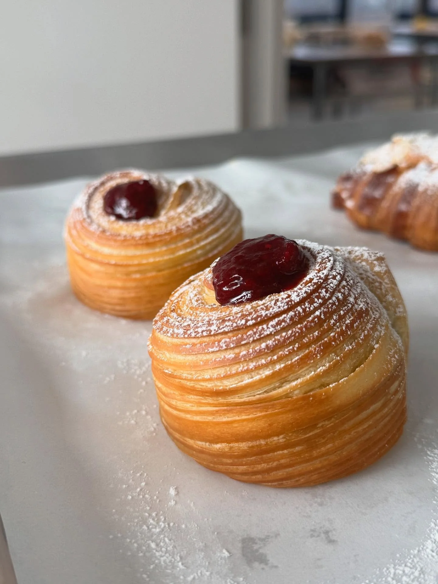 Meet our new creation &mdash; the Berry Nest! 🫐🍓

Delicate layers of buttery laminated dough, baked to golden perfection, embrace a smooth vanilla custard and a touch of sweet berry compote.
Crispy on the outside, soft and creamy inside &mdash; a b