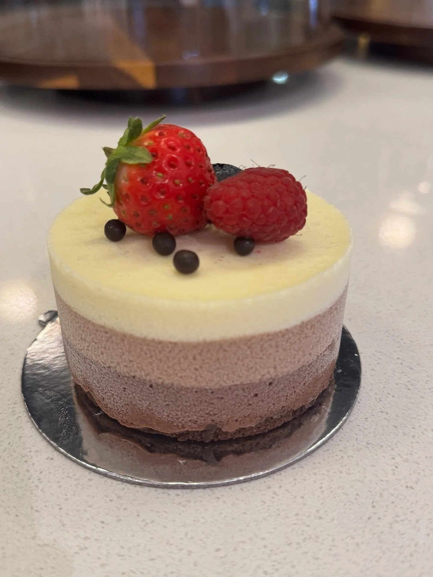 New on our dessert menu &mdash; &ldquo;Three Chocolates&rdquo; 🍫✨
A delicate mousse cake with three layers of pure chocolate bliss &mdash;
dark, milk, and white &mdash; perfectly balanced in flavor and texture.
Light, smooth, and irresistibly elegan