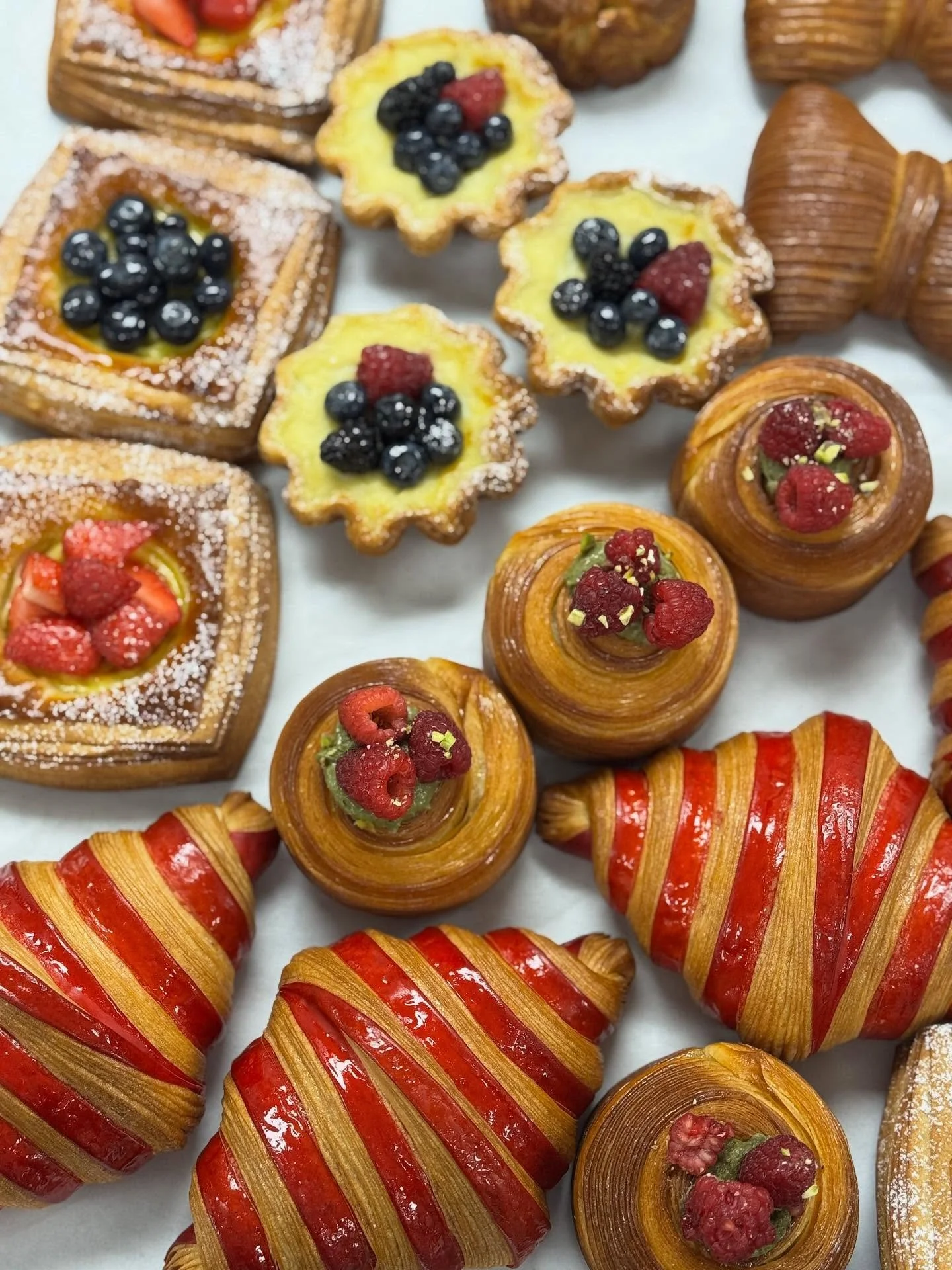 ✨ A colourful morning at Fleur De Lys Bakery! ✨
And today we have something extra special &mdash; our bicolour croissant with cherry filling 🍒🥐

Crisp laminated layers, a vibrant berry stripe, and a juicy cherry centre that brings the perfect balan