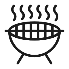 Barbecue grill with steam rising from it.