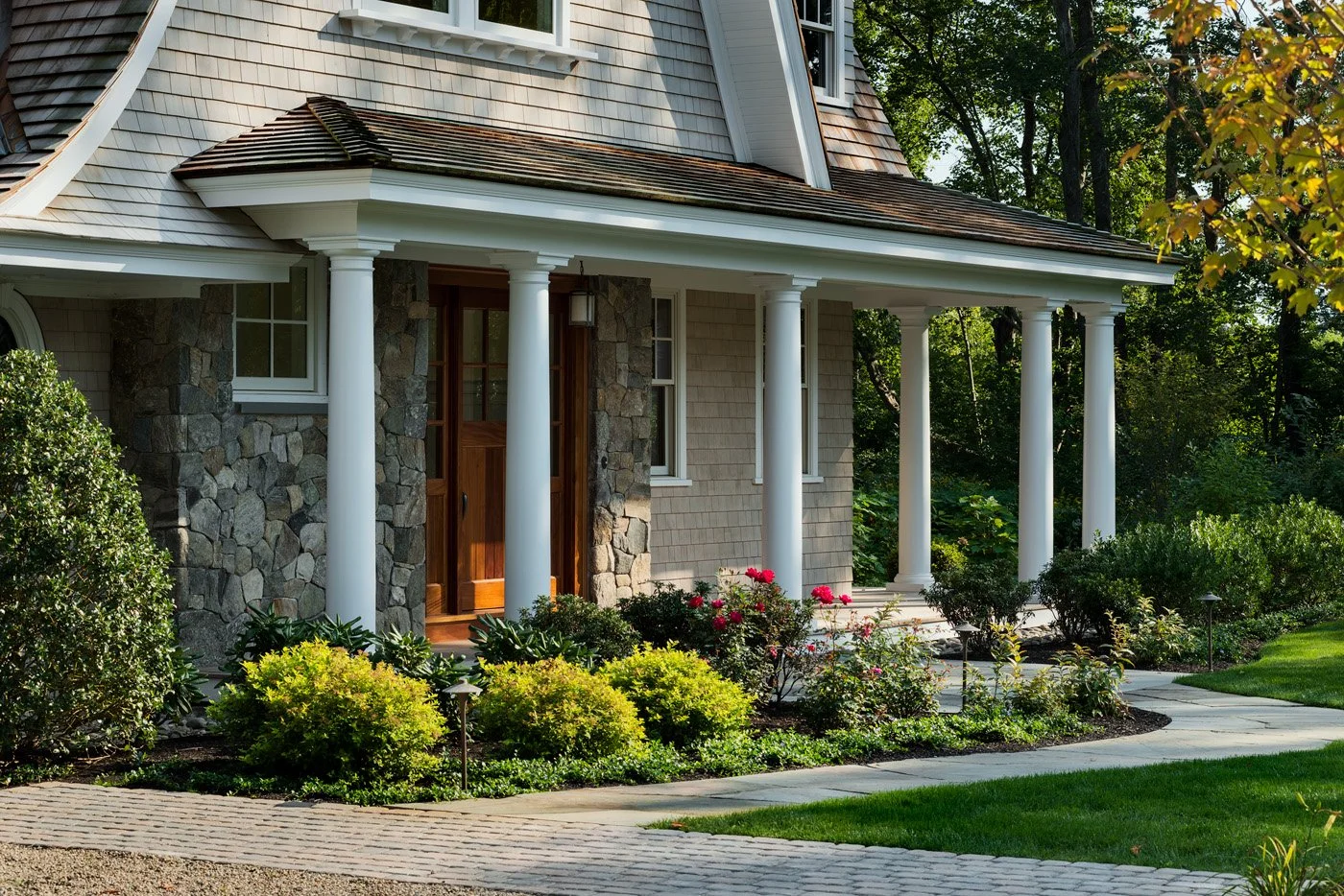 Wildwood Retreat — A New England Home Landscape Architecture and Outdoor Living Design by Vicky Martel of Sea Laurel Landscape Architecture.
This residential project showcases custom landscape design that enhances natural beauty, elevates curb appeal