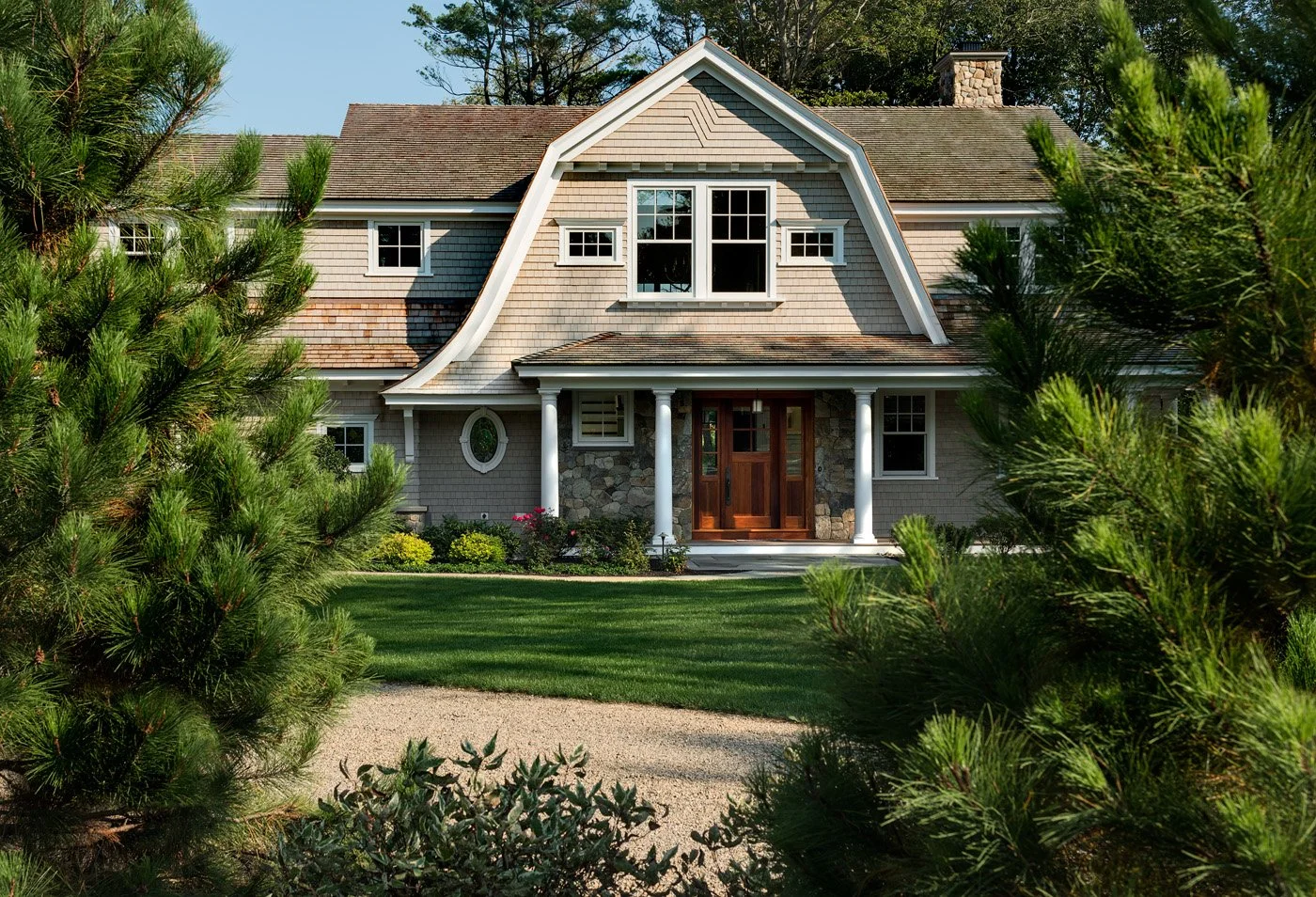 Wildwood Retreat — A New England Home Landscape Architecture and Outdoor Living Design by Vicky Martel of Sea Laurel Landscape Architecture.
This residential project showcases custom landscape design that enhances natural beauty, elevates curb appeal