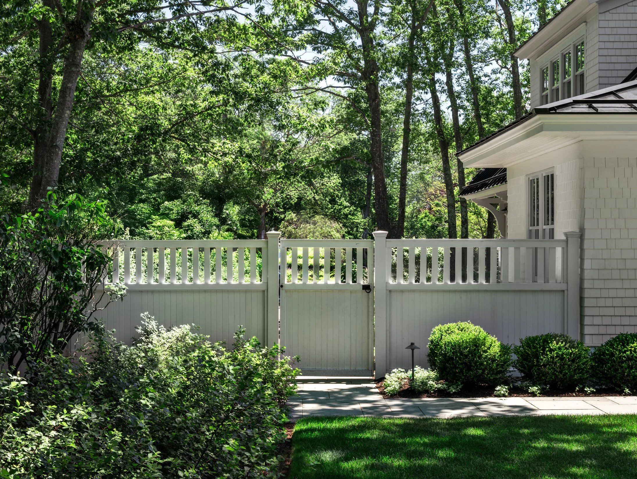 Oak Road Estate features a stunning inground pool, a modern barn-style farmhouse, and a beautifully cultivated garden. Designed by Sea Laurel Landscape Architecture, this property blends refined outdoor living with timeless New England charm.