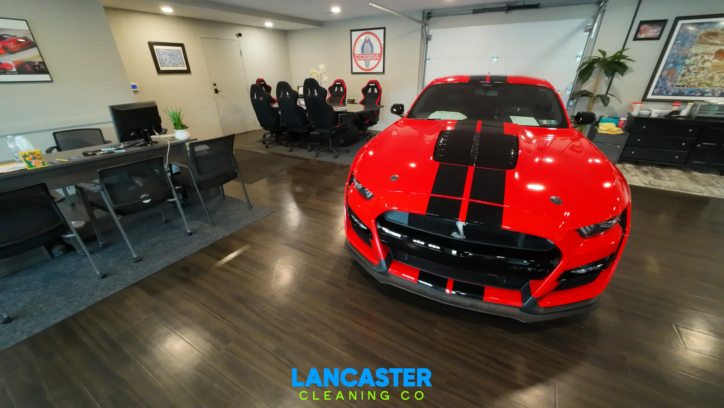 Manheim, PA car dealership cleaning featuring cleaned and buffed floors, sanitized desks, and clean coffee bar
