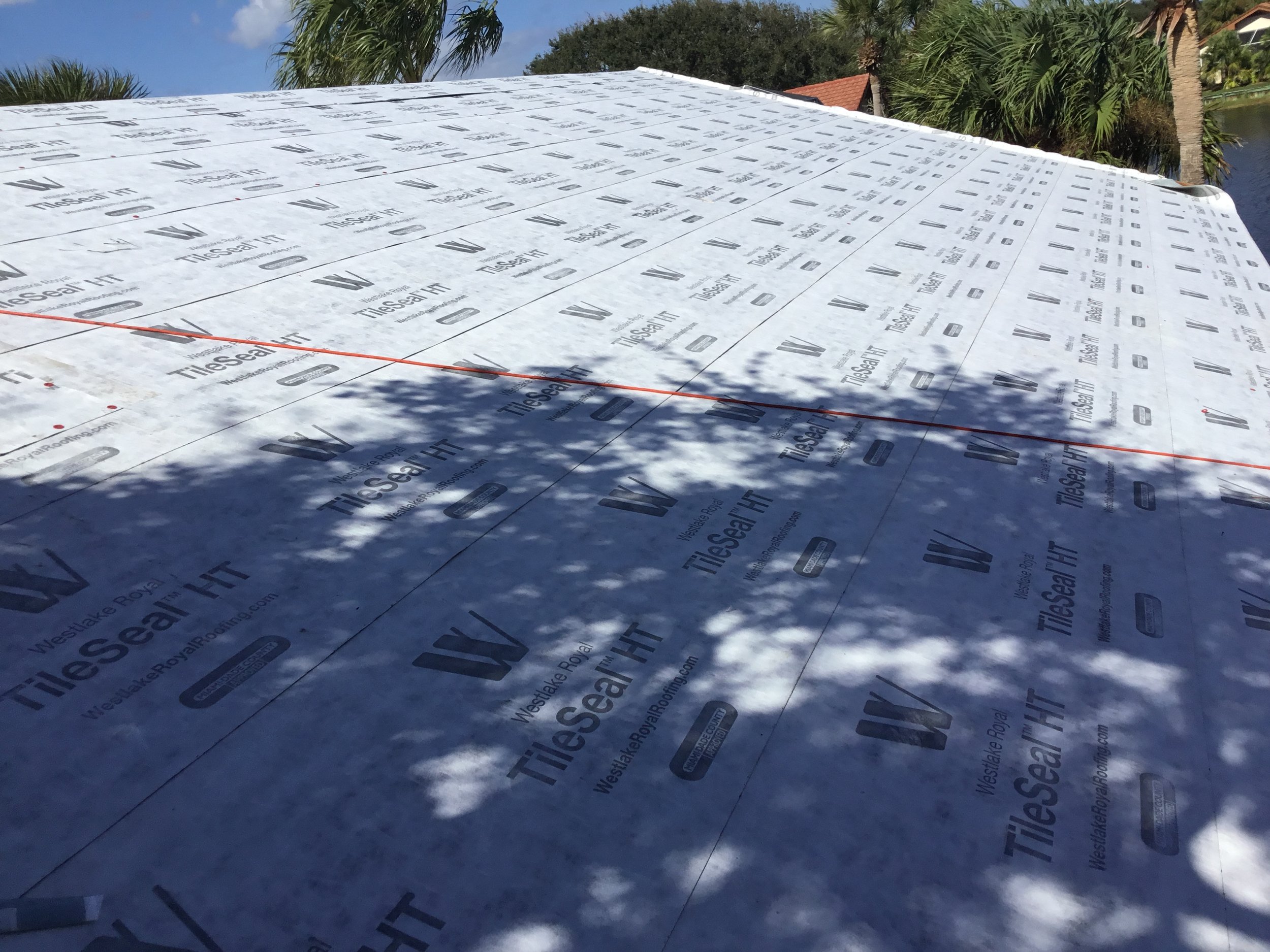 High-temperature peel-and-stick underlayment installed specifically for tile roofing, designed to withstand extreme heat without breaking down or slipping. This upgraded membrane provides a durable secondary water barrier beneath the tiles, adding cr