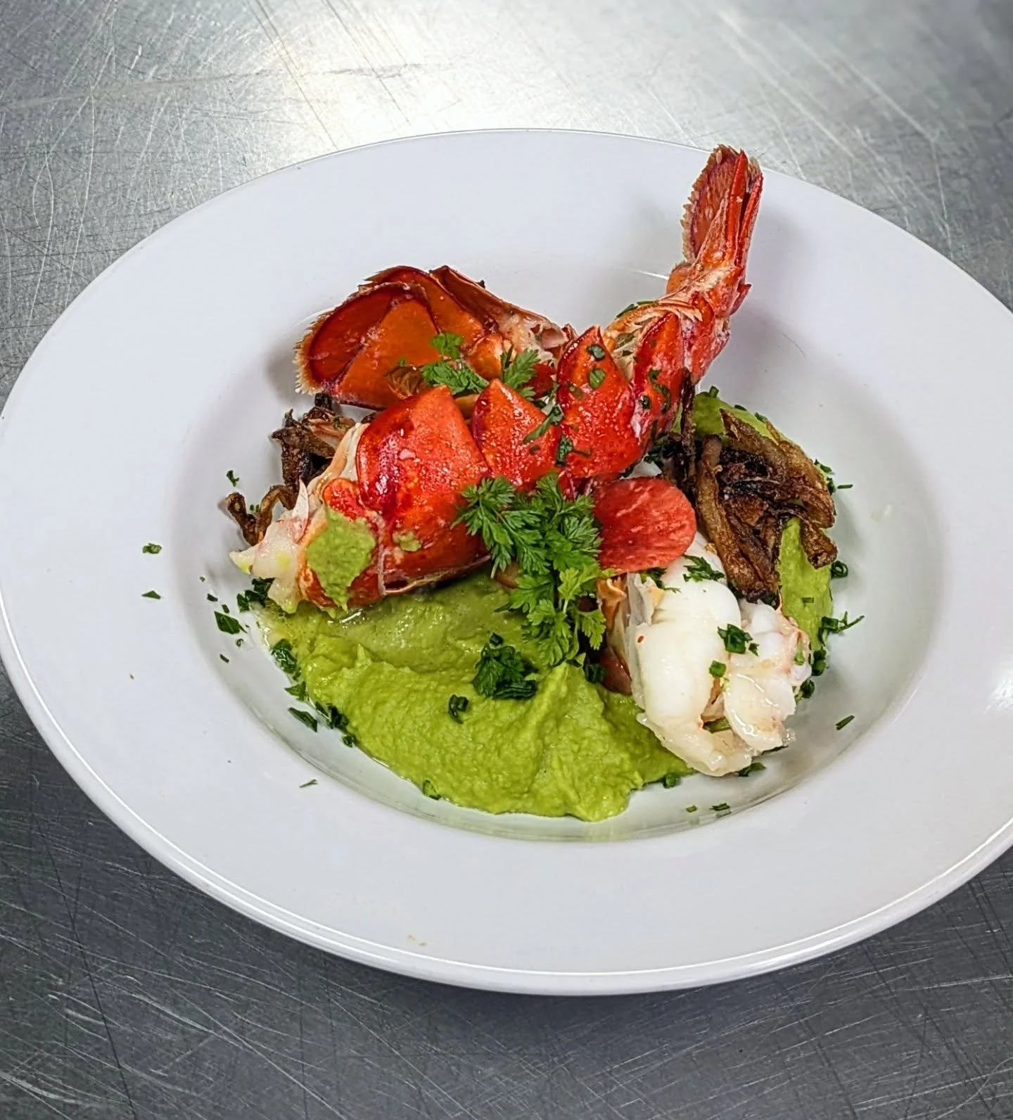 Better late than never! This was my course at the last dinner of our 3x4 series. Butter poached lobsters, creamy pea puree, crispy shallots and pickled radish. It was delicious!