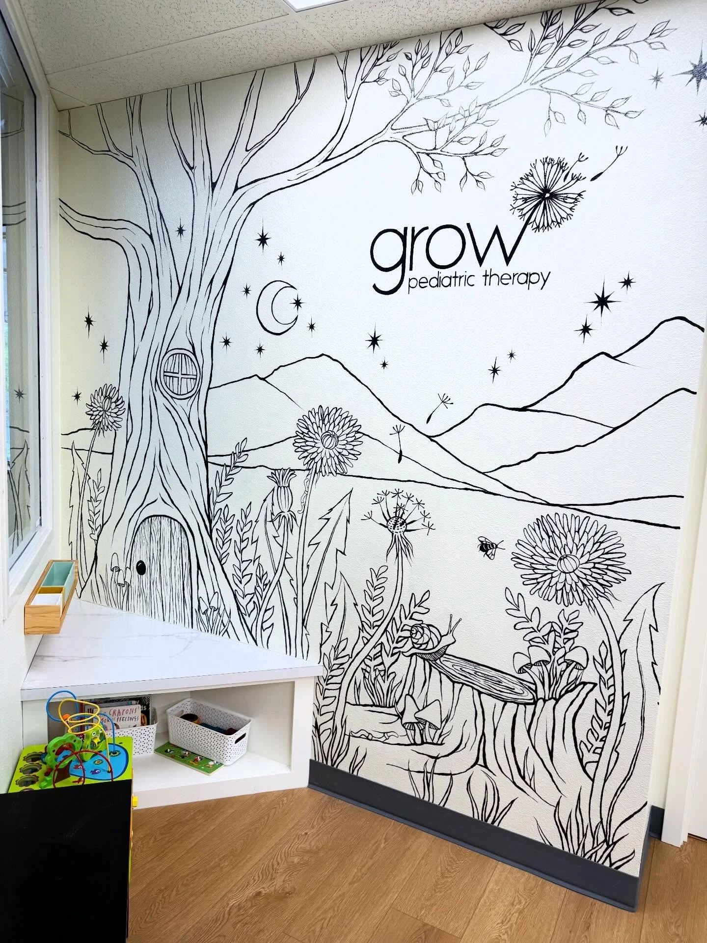 I Had such a fun time designing &amp; creating this mural for @growkidstherapy! This mural is in their brand new reception area and is painted with whiteboard paint so their clients can color in the mural! So excited to see how this evolves over time