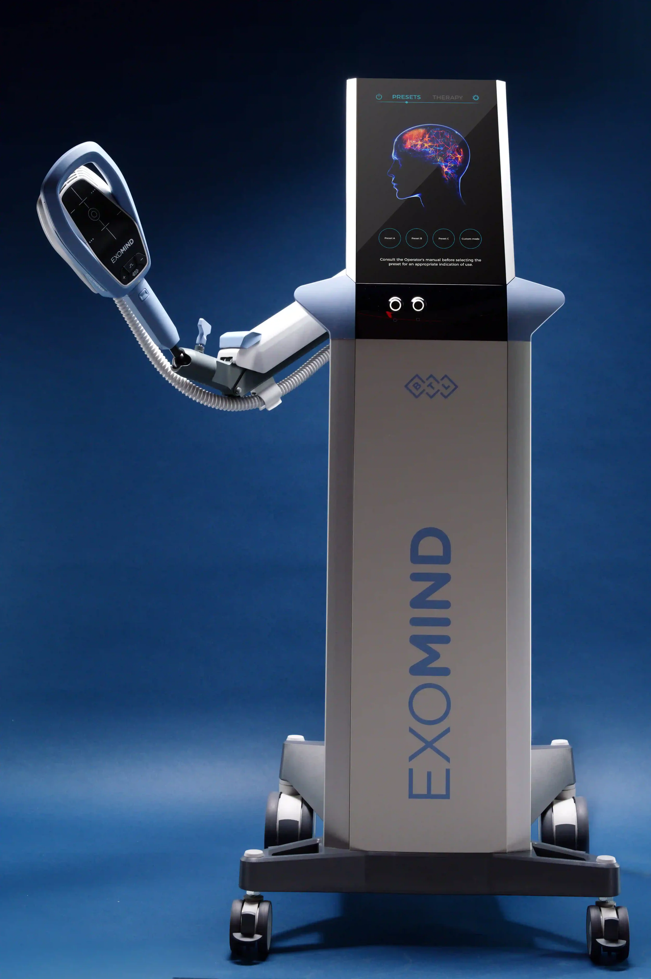 Medical robot with a digital display and a robotic arm, labeled 'EXOMIND,' intended for brain therapy or diagnostics.