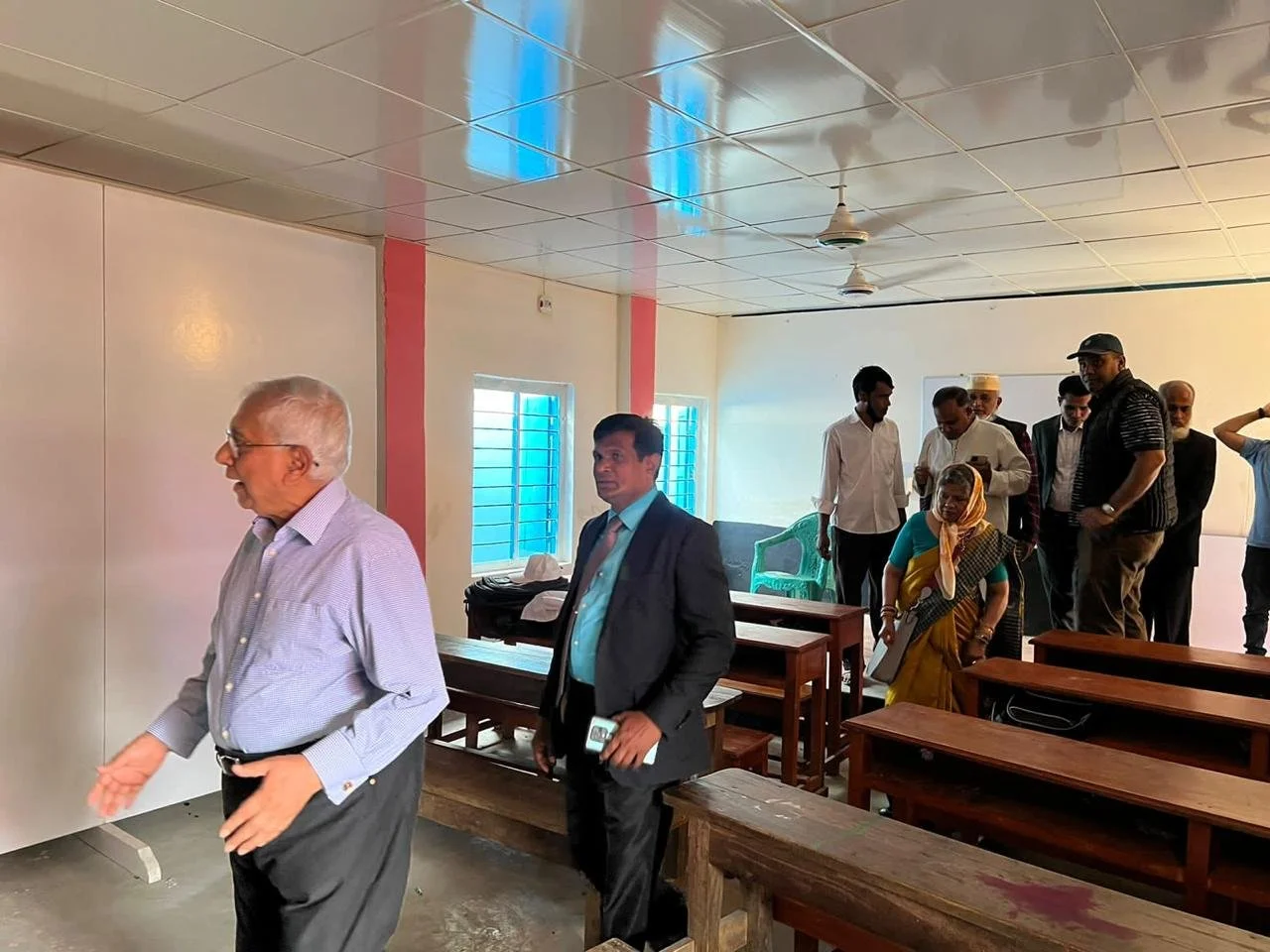 Gen Ghulam Quader and Prof Dil Afroze Quader inspecting new classroom.