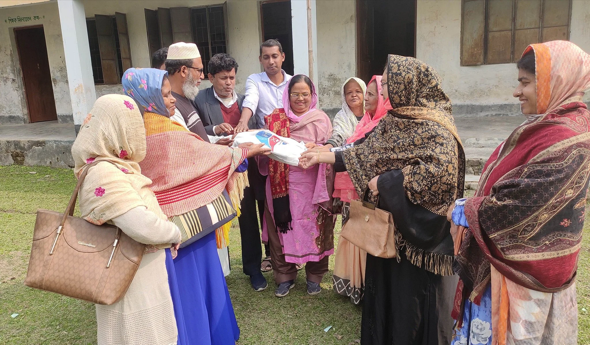 Teachers receiving donations.