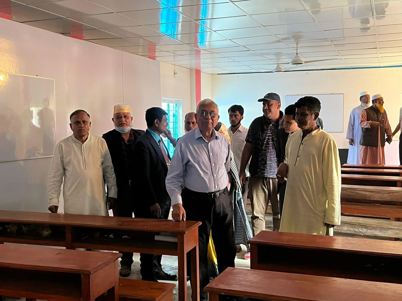 Gen Ghulam Quader and Prof Dil Afroze Quader inspecting new classroom.