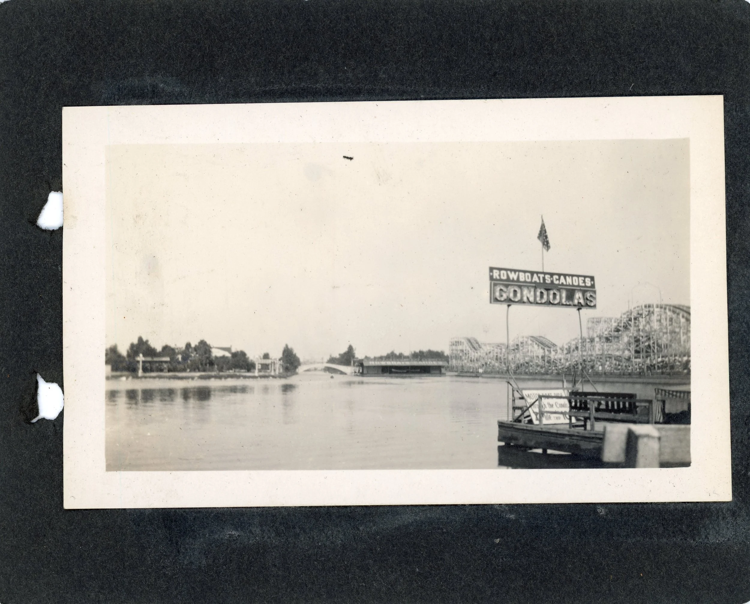 Page from anonymous photo album, 1913-1914.  Photographic prints shows a gondola dock overlooking the Venice lagoon. from from the Stephen Pouliot Collection (P-8)
