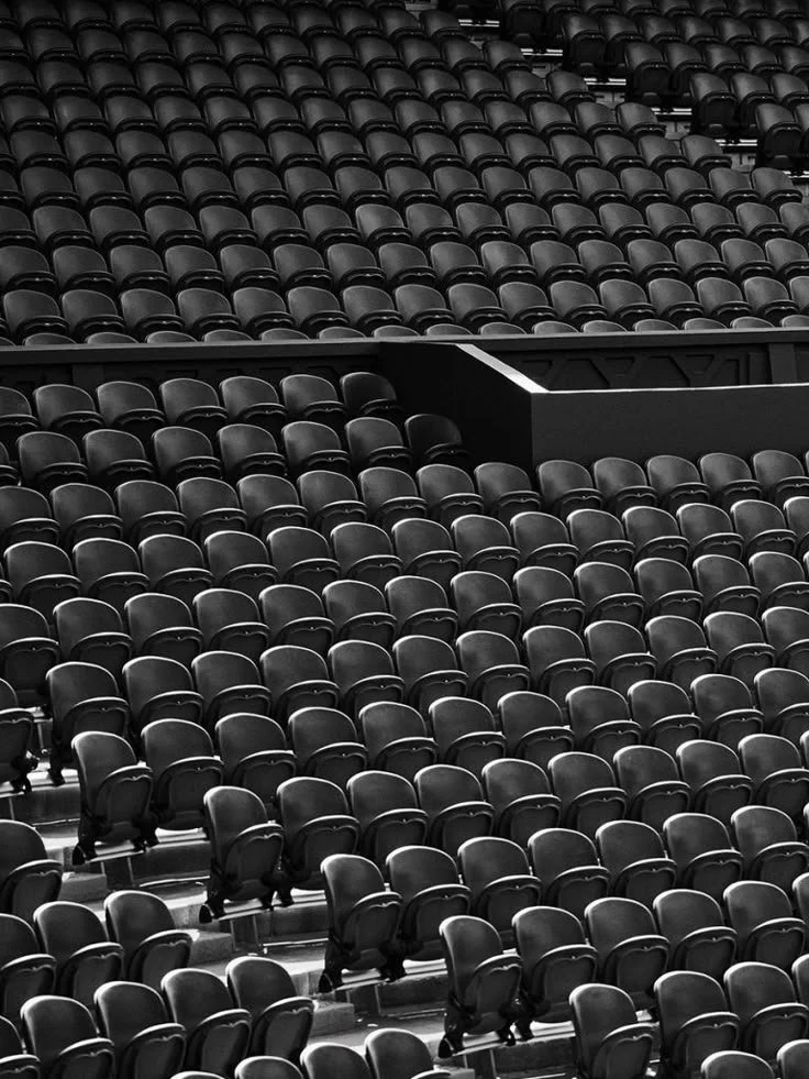Empty stadium seating at professional soccer venue in Scotland