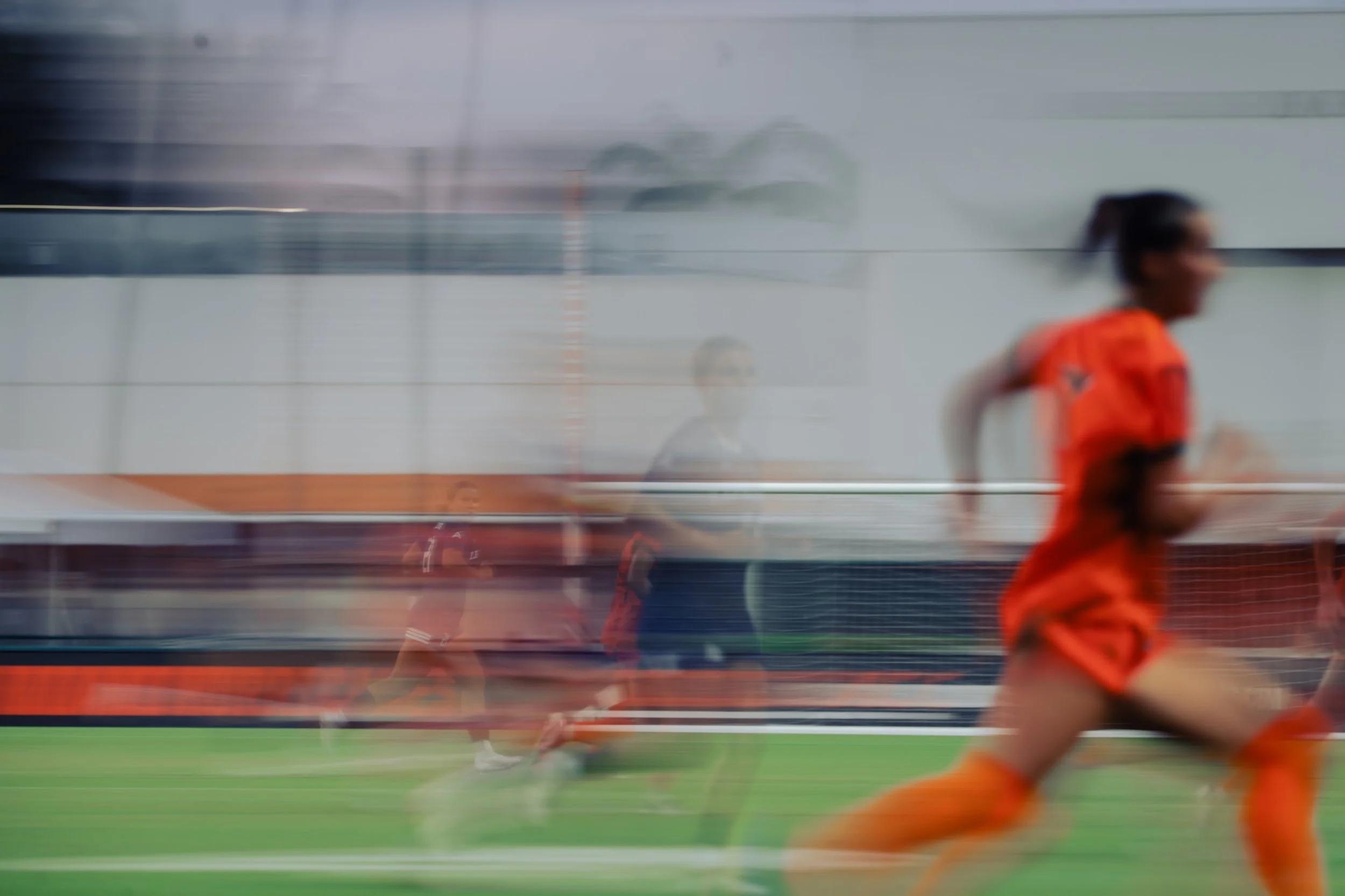 University of Miami women's soccer player competing in a college match