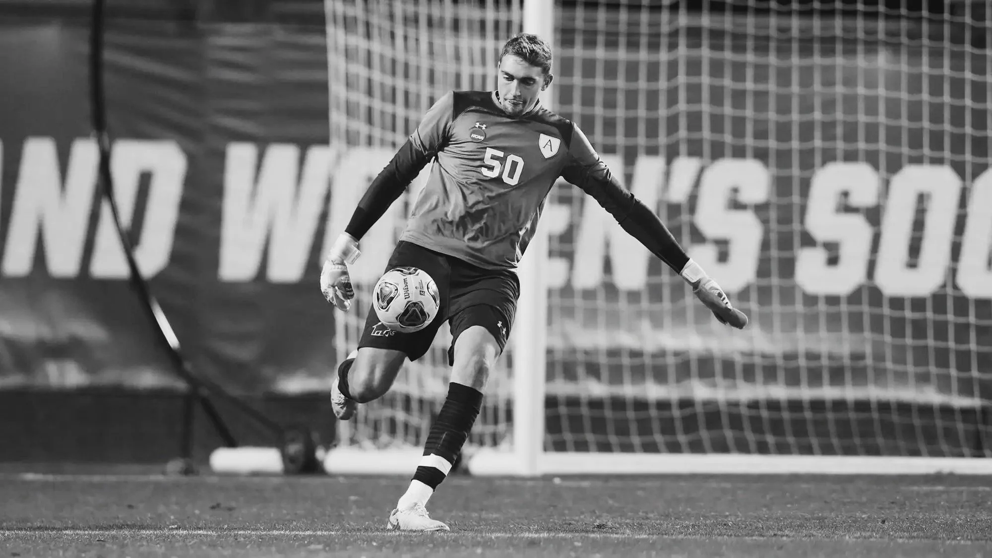 Bernie White playing NCAA college soccer for Amherst College