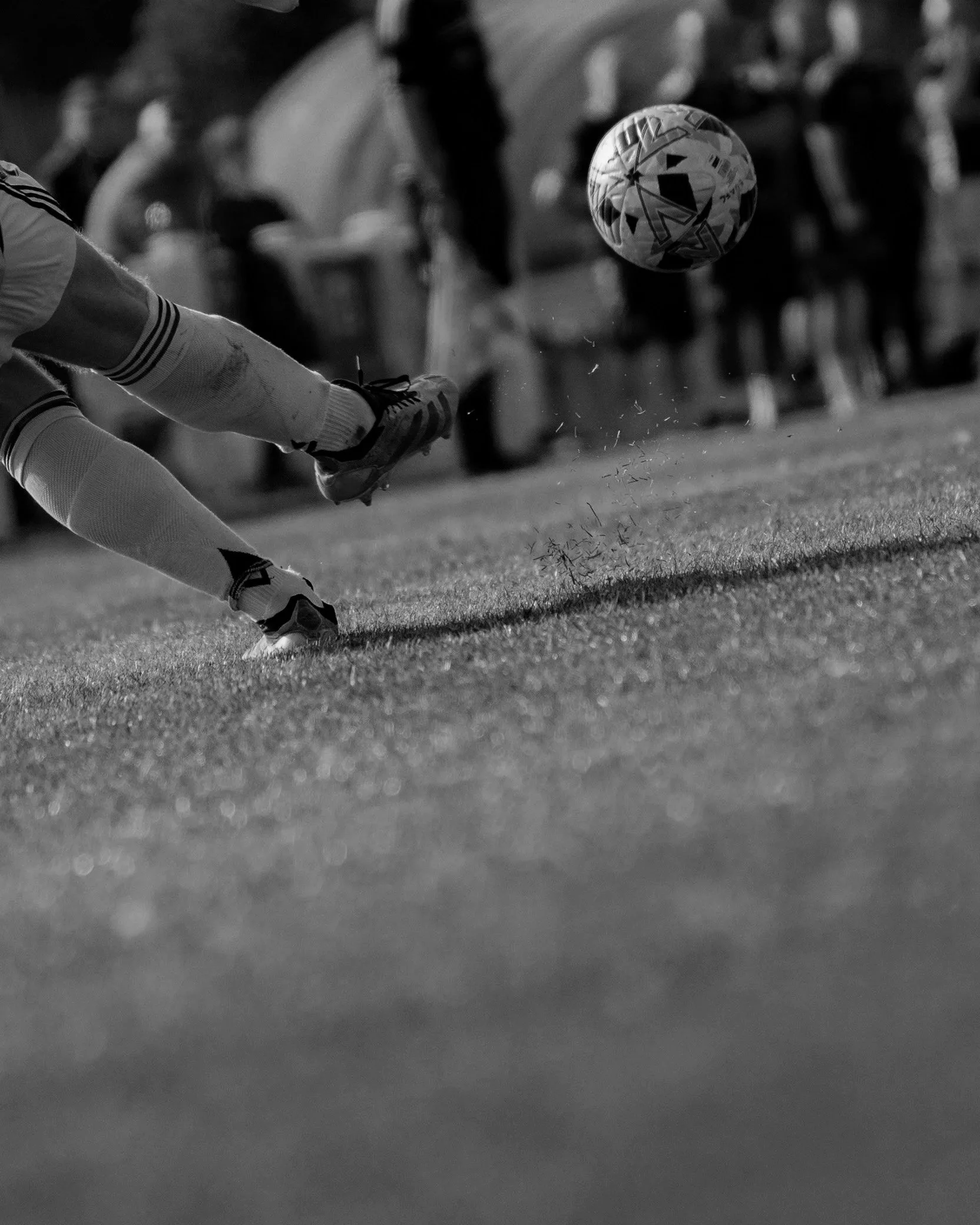 Irvine Meadow player competing against Edinburgh University in the Scottish Cup