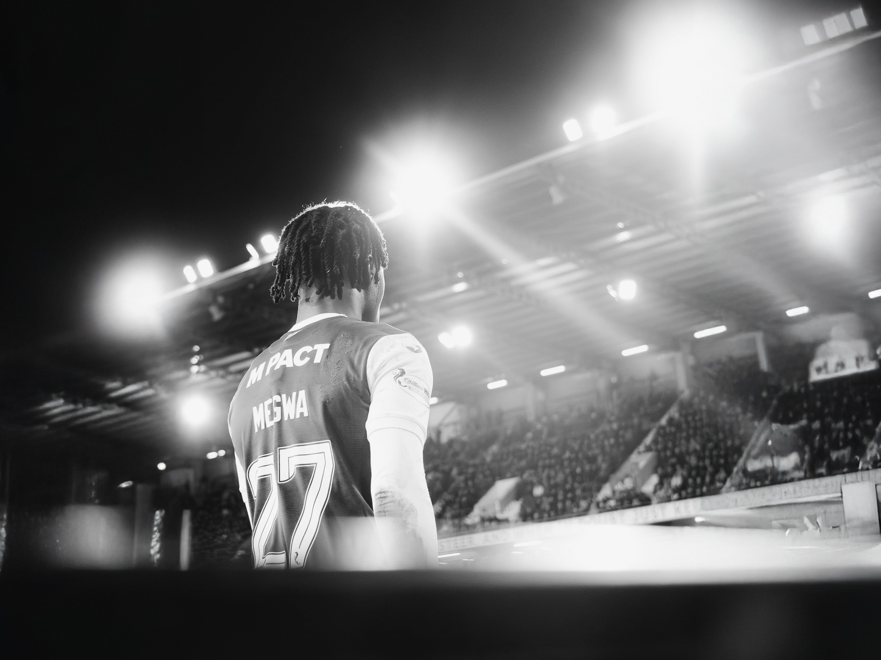 Professional soccer match at Scottish stadium