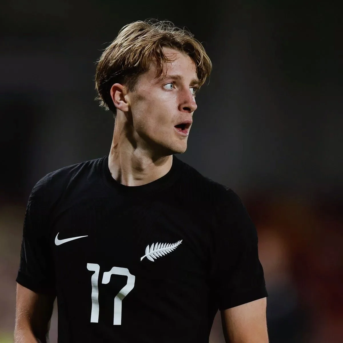 lex Greive playing for New Zealand national soccer team