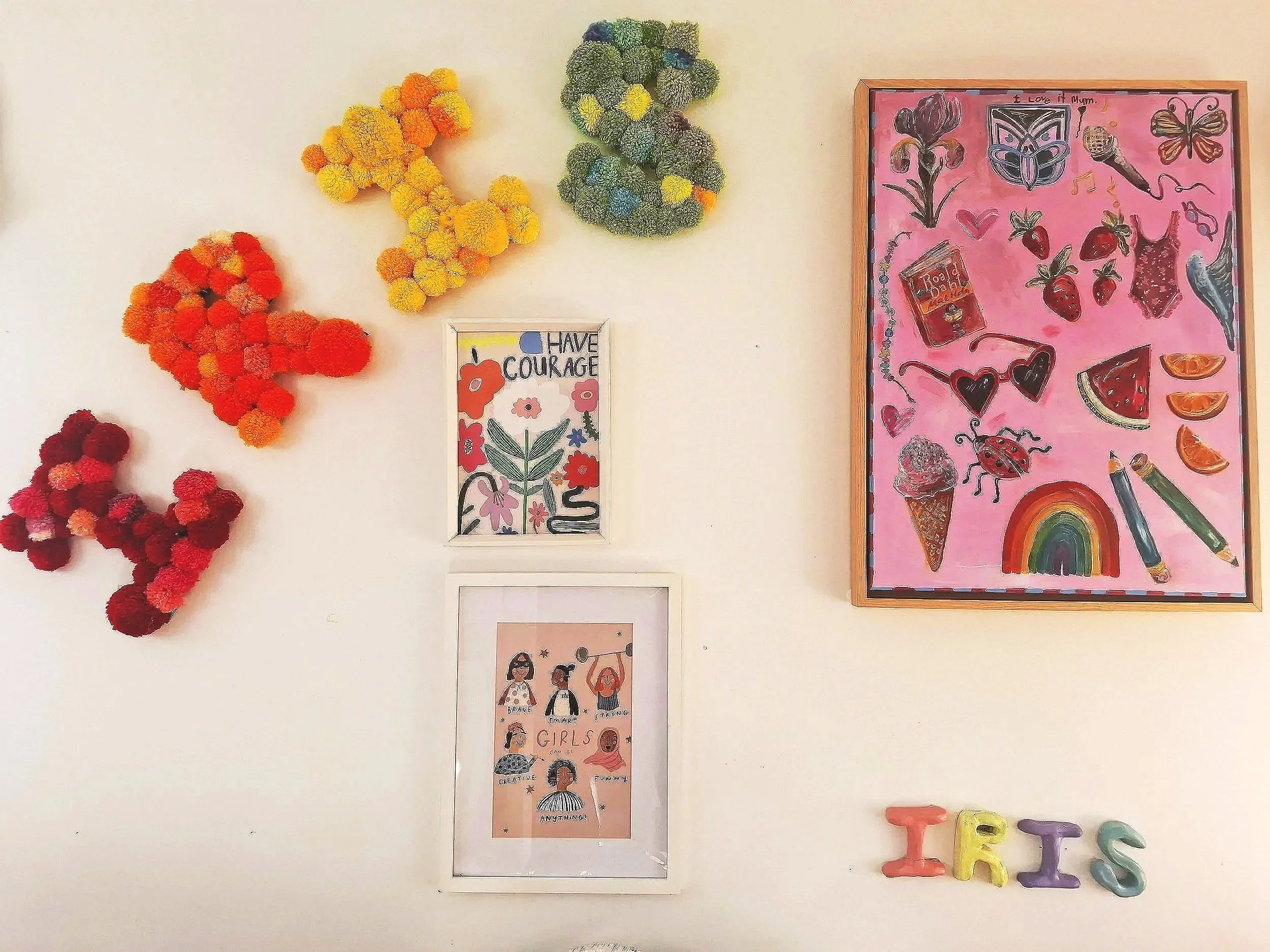 Some art work for my daughter Iris's room - the pom pom name, the ceramic name and the pink painting of lots of her favourite things, including the WARRIORS!