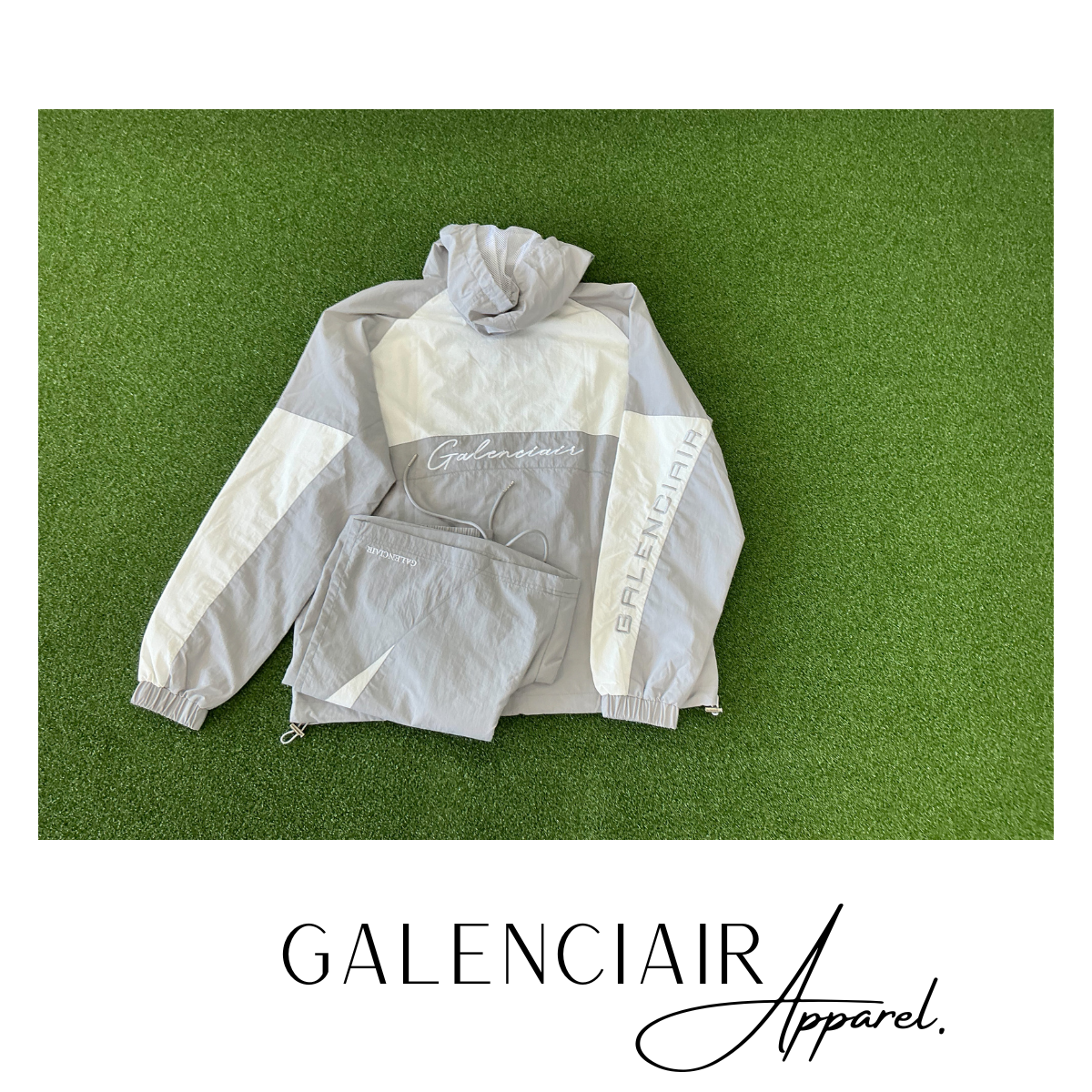 A light gray and white Galenciair Apparel jacket