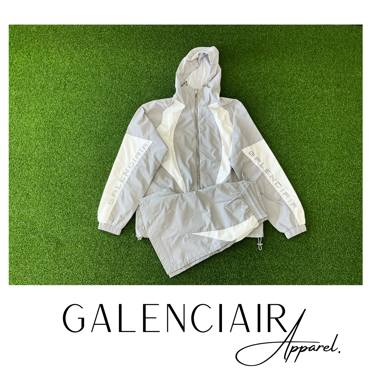 A light gray and white athletic jacket and matching pants with GALENCIAIR branding.