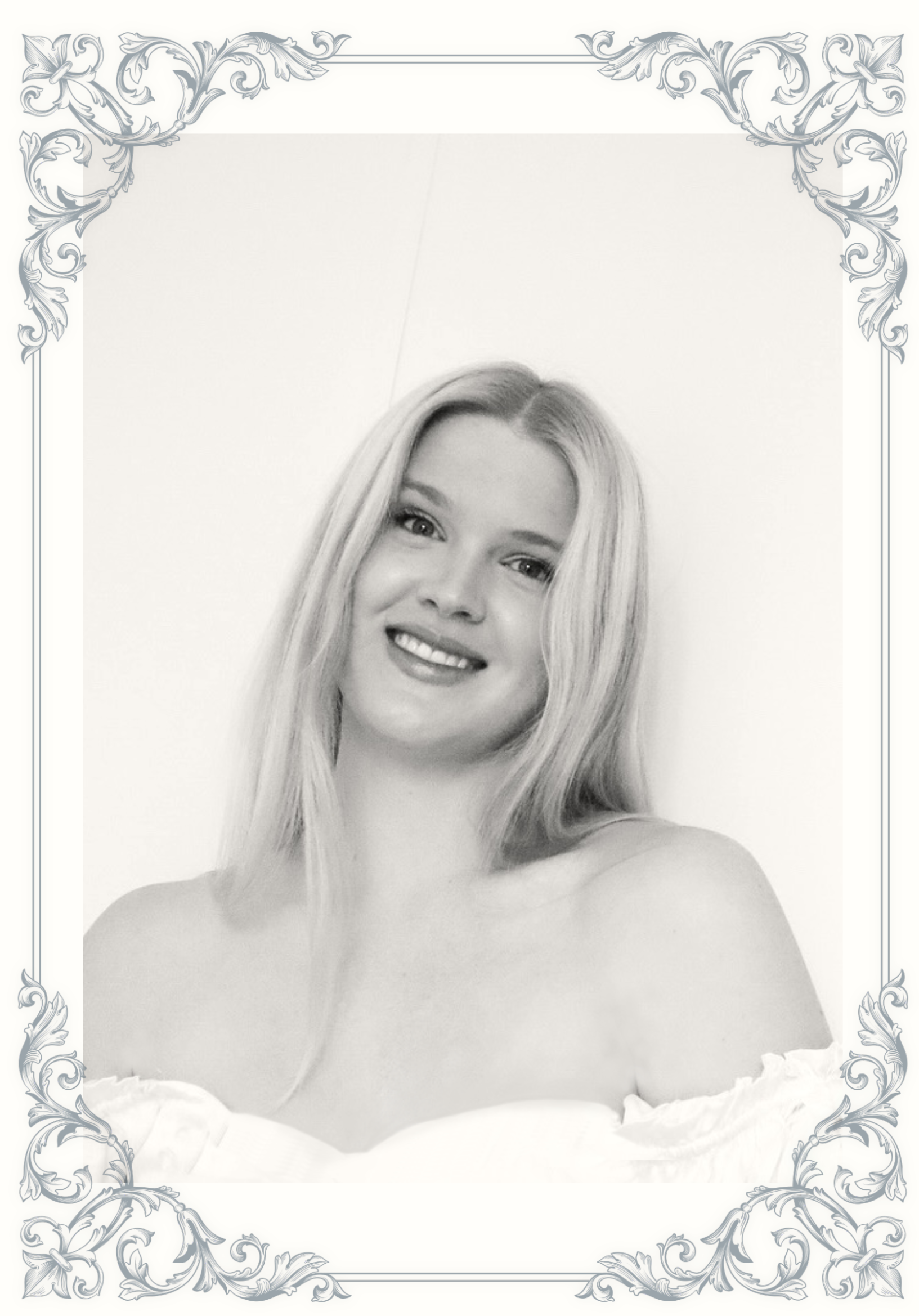 Black and white portrait of a smiling blonde woman with long hair, framed by ornate scrollwork border.