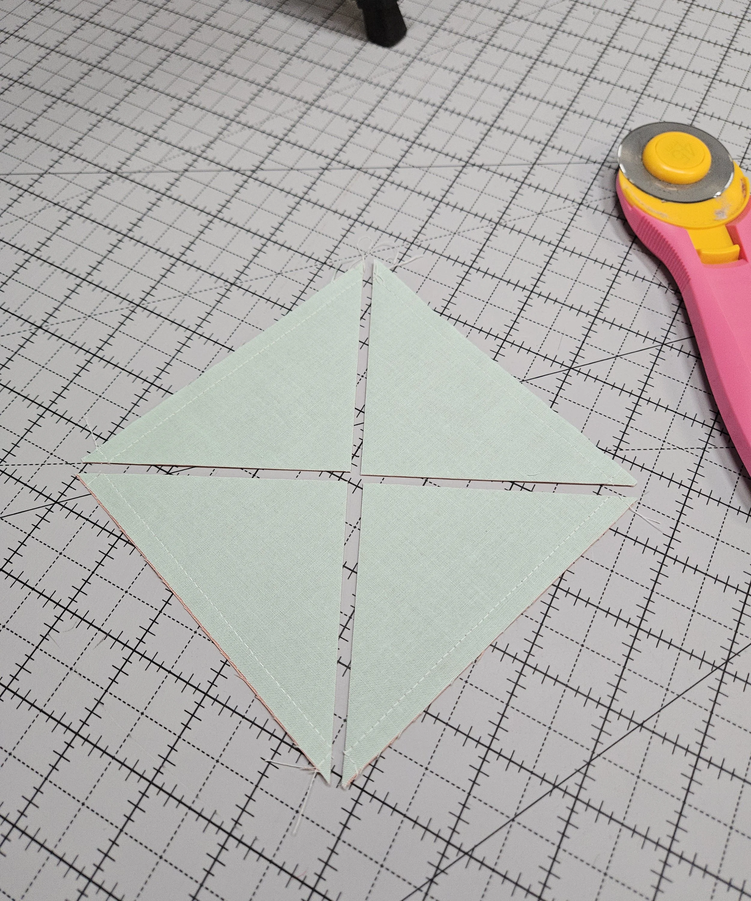 Four-at-a-Time Half-Square Triangles