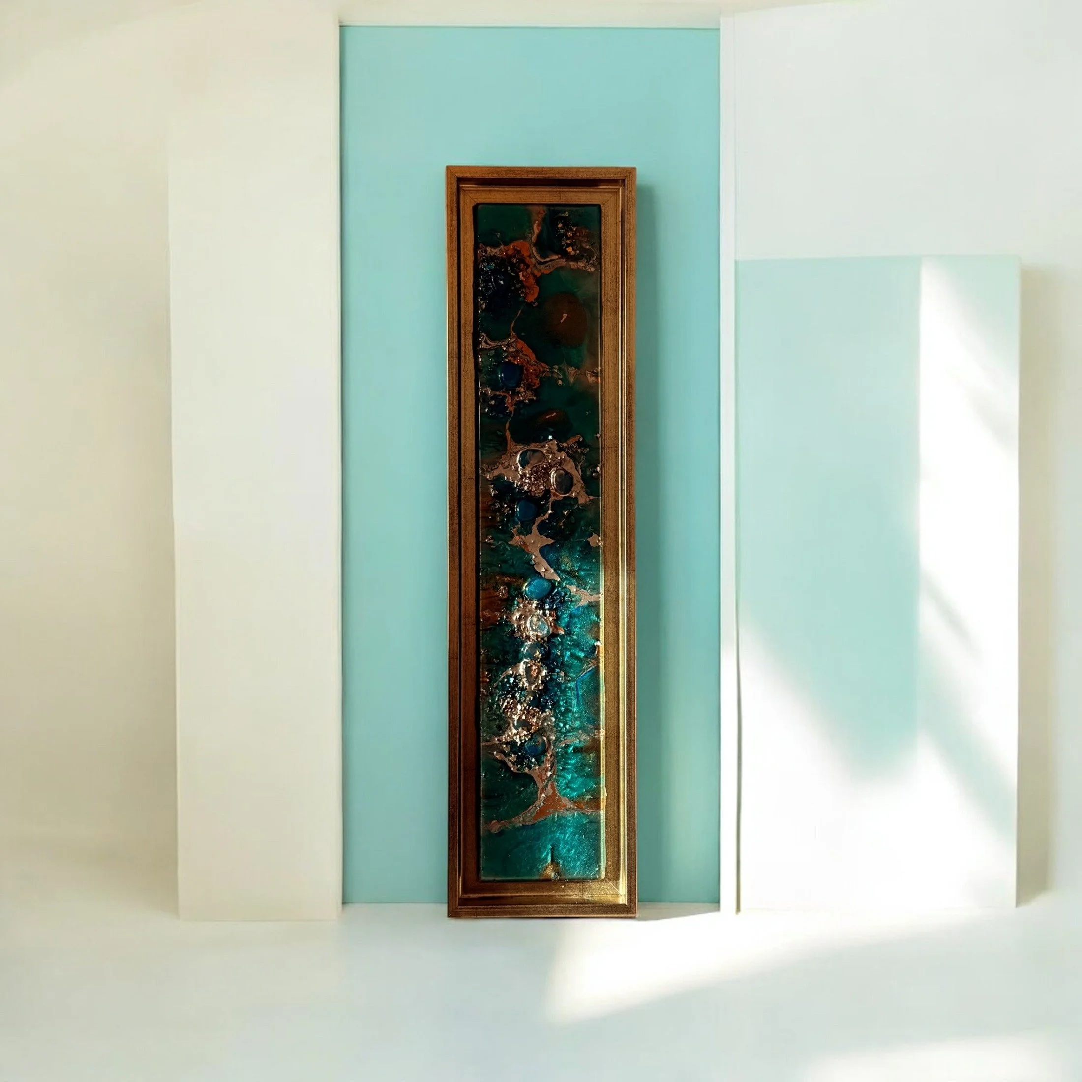 Celestial Waterfall
2024 · 17 × 60 × 5 cm
Resin, pigments, wood, gold pigments, gold and silver leaf, and luminescent turquoise glow stones.
A vertical composition of deep blue, turquoise and metallic accents evokes cascading water and celestial ligh