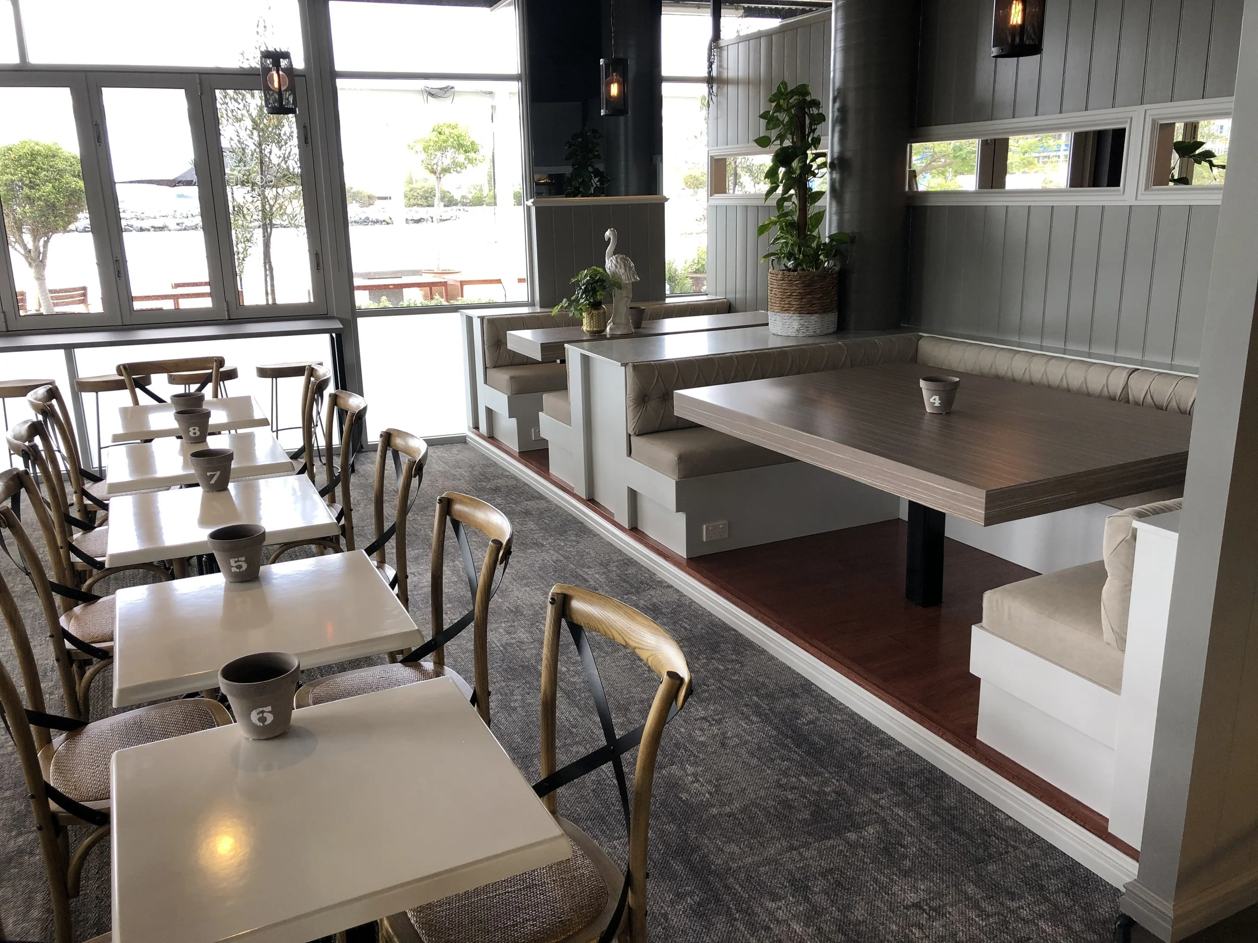 waterfront modern restaurant interior with aesthetic interior built by local custom builder doing commercial builds and fit outs in south west western australia