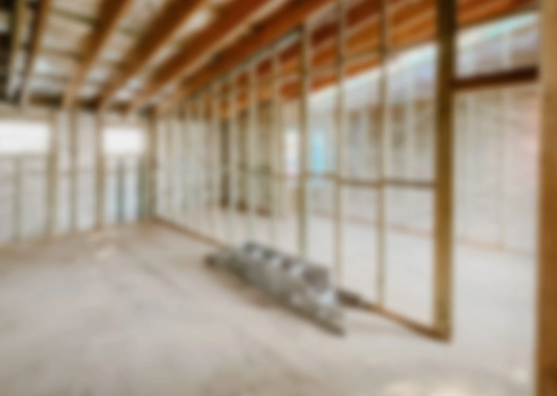 Blurred photo of an unfinished custom home build interior for busselton building company