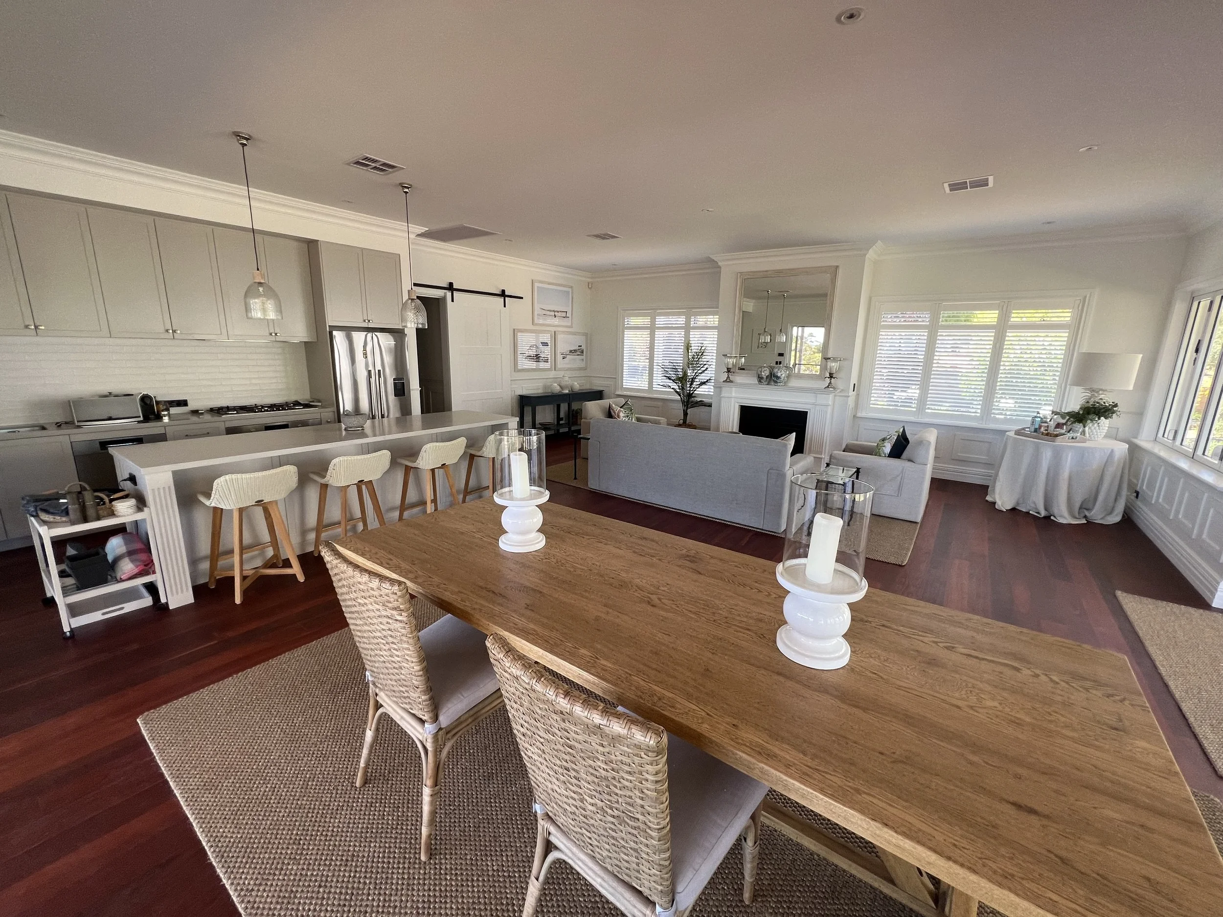 Open-concept living room and kitchen featured in custom home build by naturaliste building co, builders near busselton