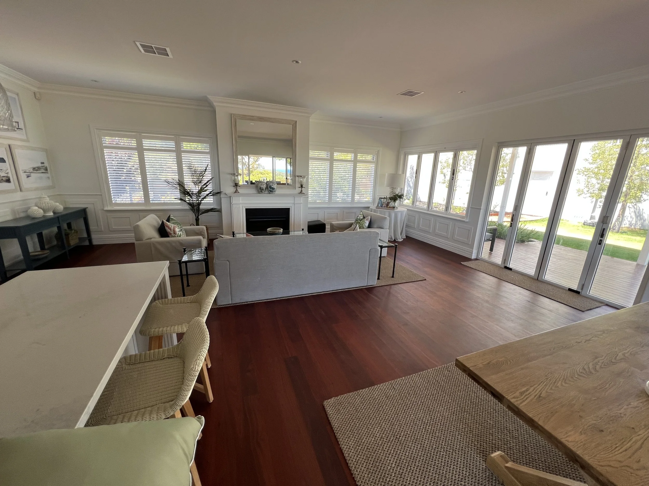 Bright living room with large windows, family home build by custom home builder located in western australia