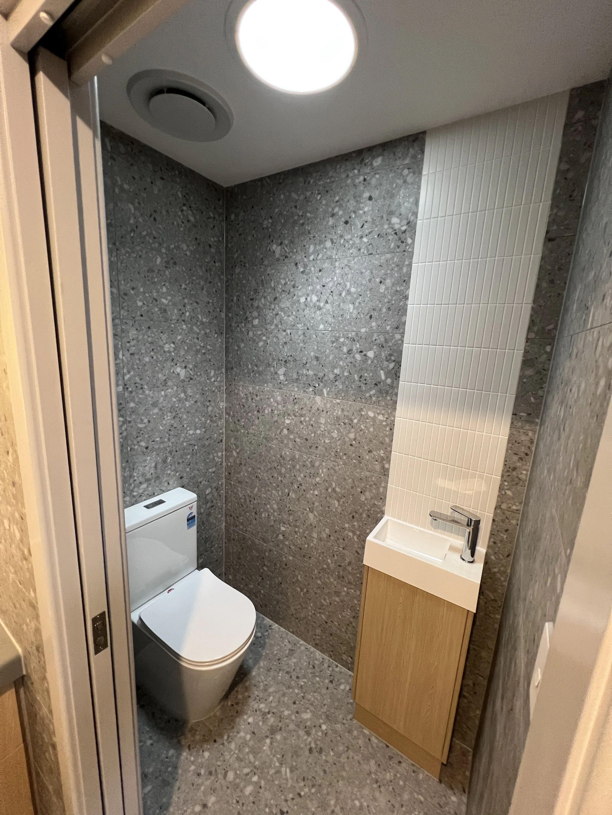 Custom home build with toilet to match bathroom in the home extension