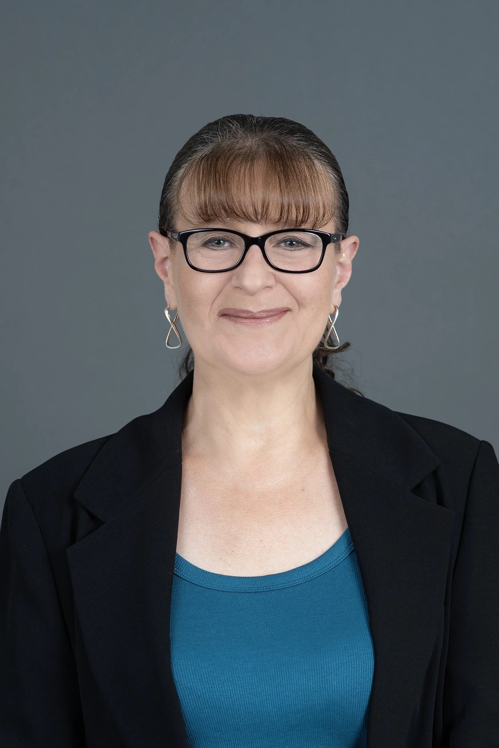 A logo with the letters 'P' and 'G' overlapping, with a red slash cutting across the middle.