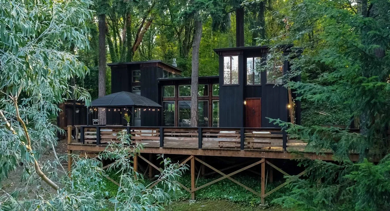 The Loft at Newcastle, a black-stained modern home set in Pacific Northwest forest