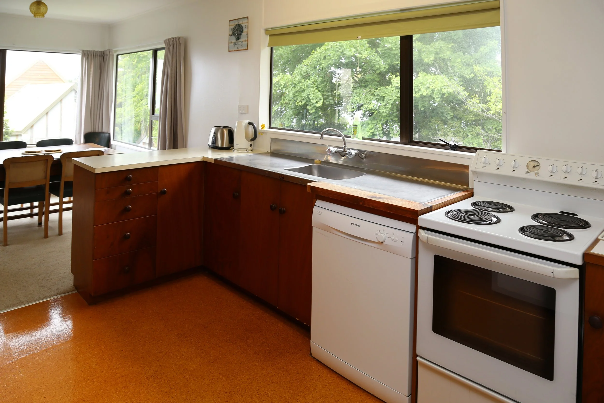 Upstairs well equipped kitchen with views