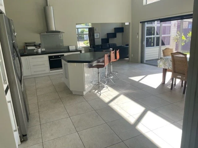 open plan kitchen, dining area with access to outdoors