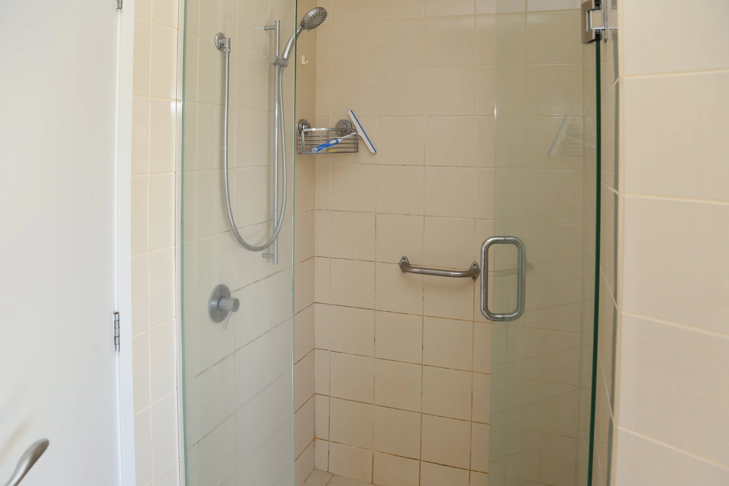shower in bathroom by master bedroom