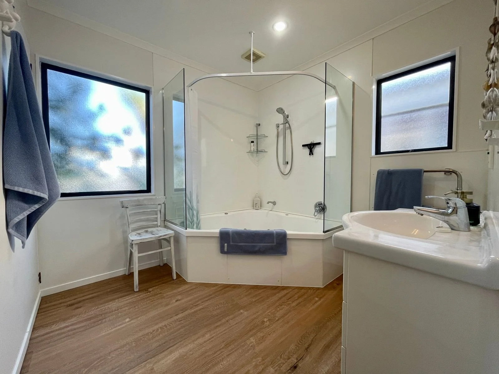 Spacious bathroom with spa bath