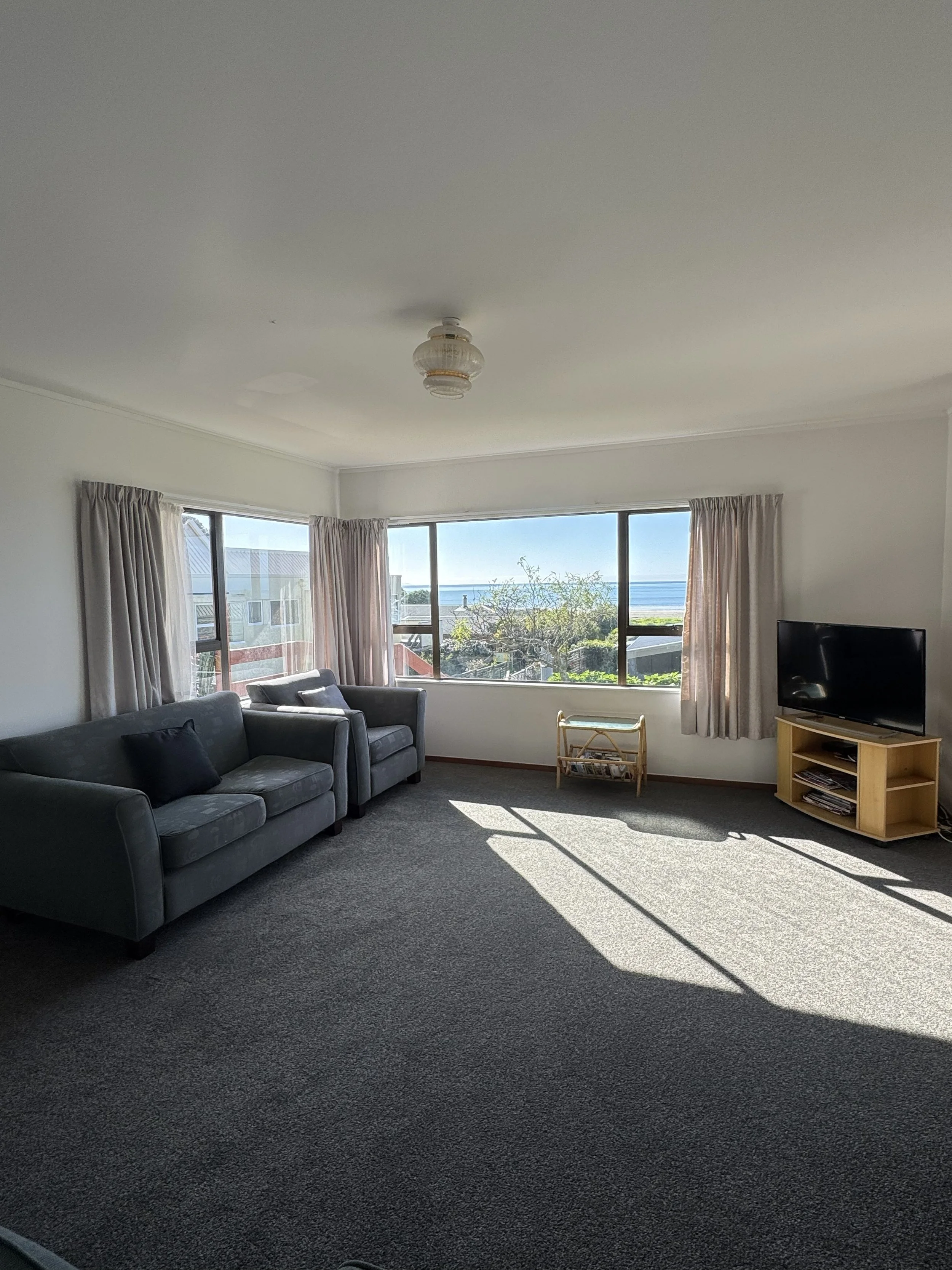 Upstairs lounge with sea views