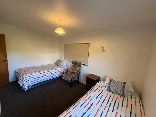 downstairs twing - 2 x king single + single rollaway