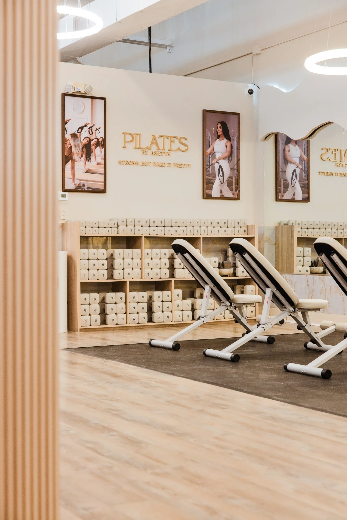 Westerville Pilates studio with reformers, strength equipment, and Pilates-inspired wall art