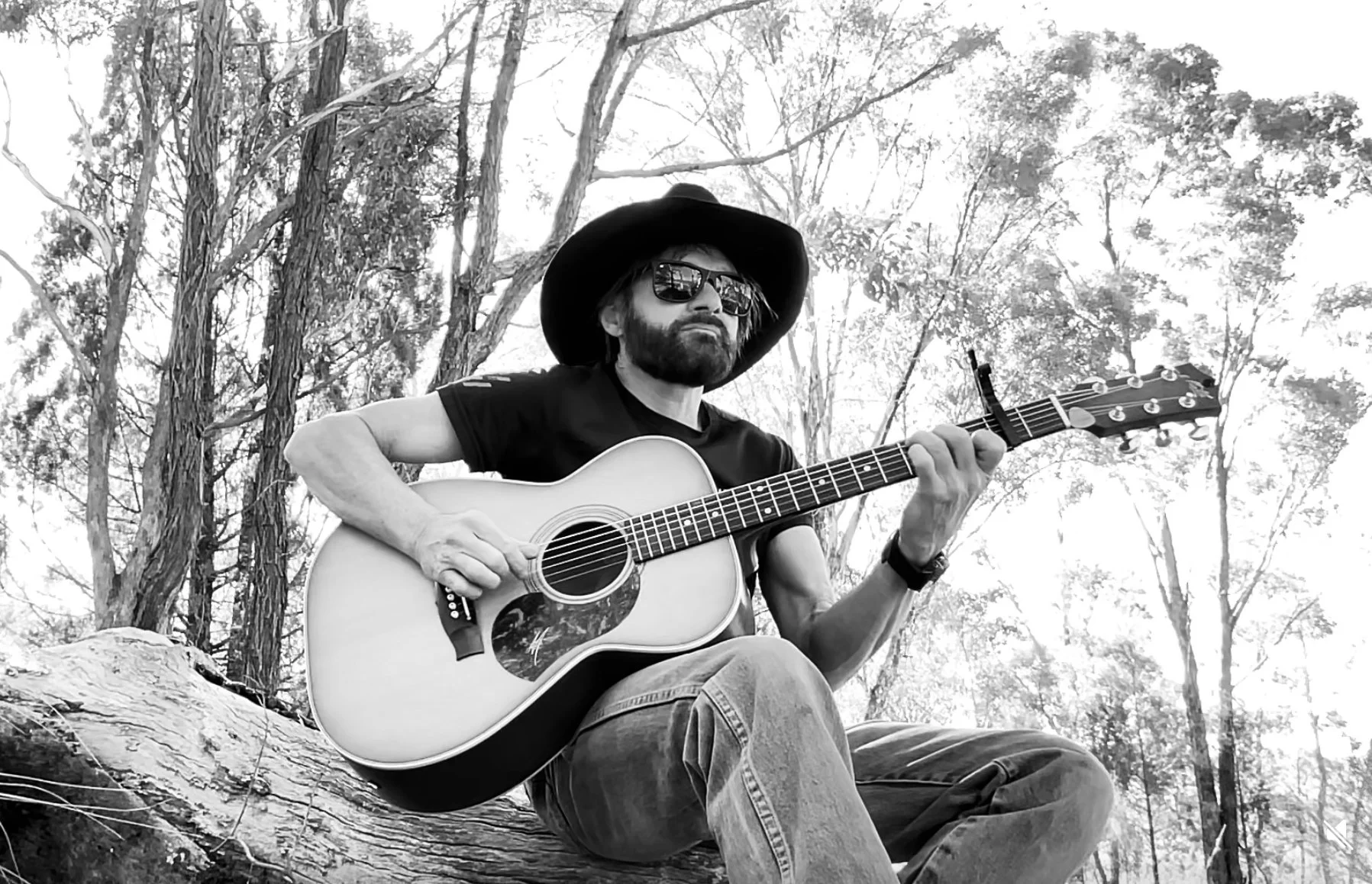 John Stokes - Outdoors on country enjoying the acoustic sounds.