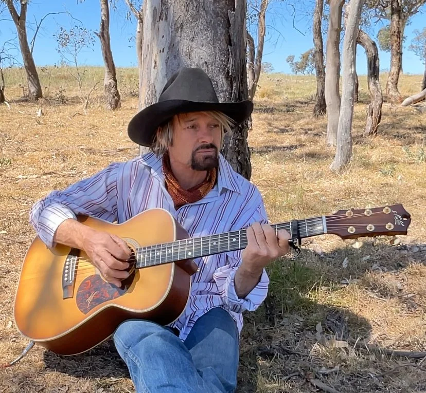 John Stokes - ’Chillin’ in the paddock playing a few tunes.