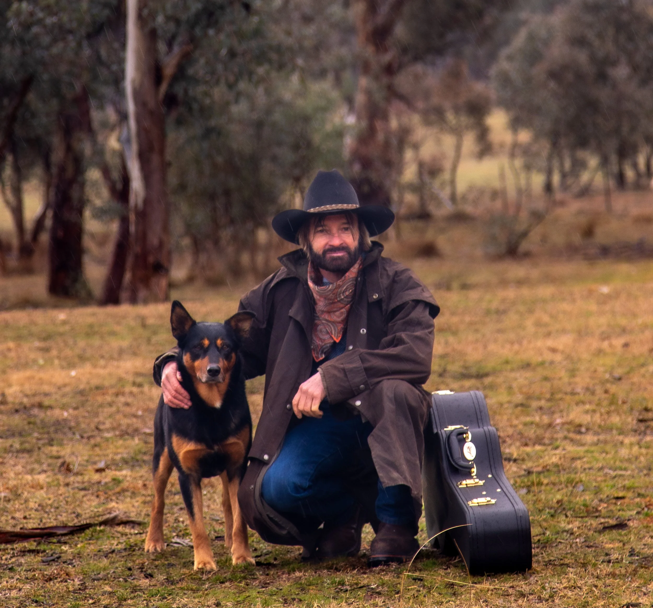 John Stokes - Cowboy’s love their dogs, guitars tuned good and clear mountain mornings !
