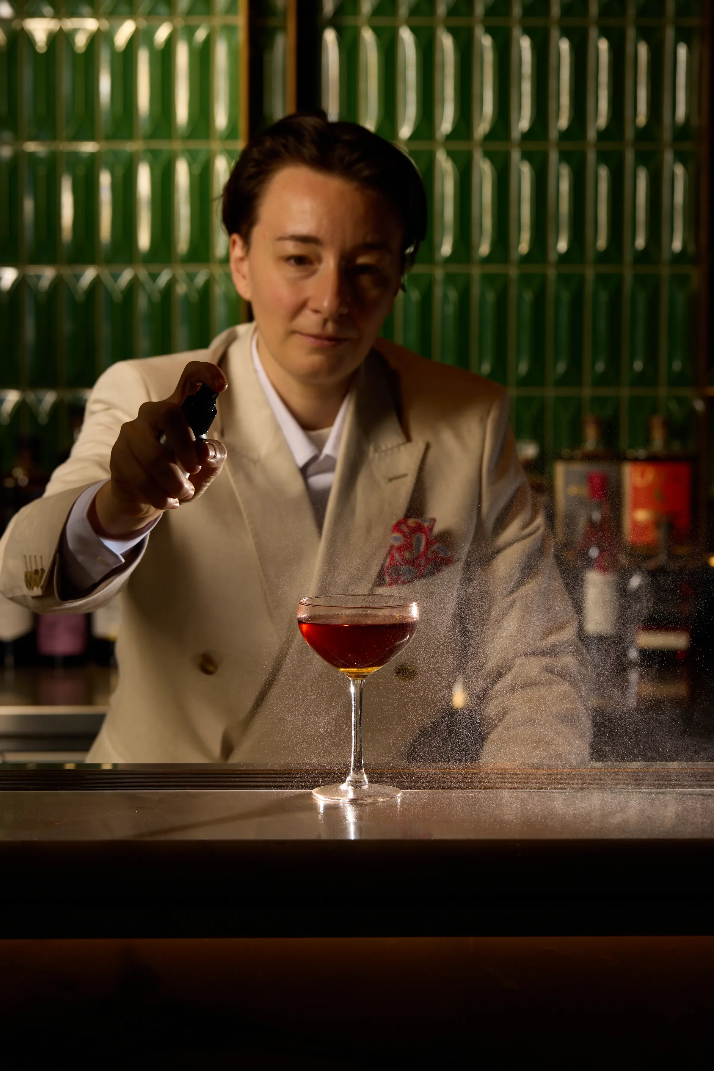 Charlotte Belvisotti beverage consultant making a cocktail at Novotel Cabramatta at Lotus bar