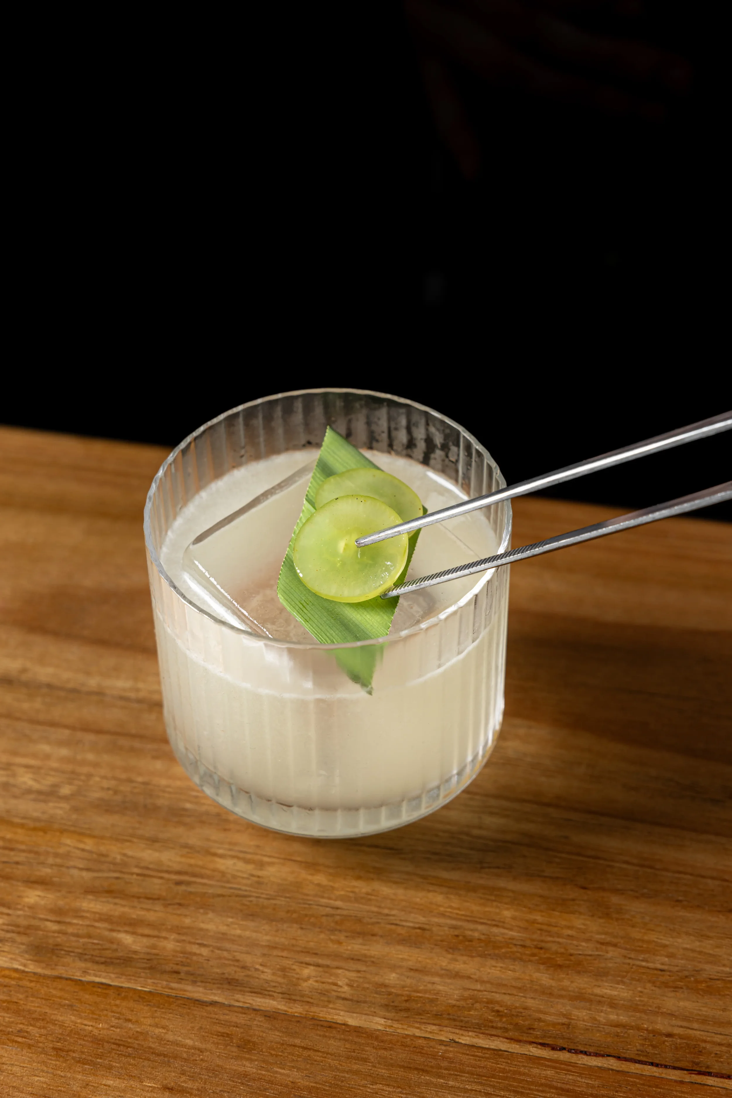 Panda Frost Cocktail with white grapes, iced riesling, citrus, pandan, Tried & True Vodka. Drinks consultancy by Mindset Spirits in Surry Hills.