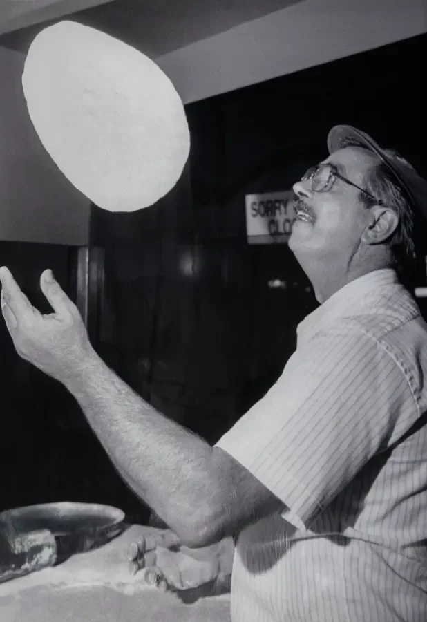 Emilio making pizza dough at emilio's restaurant